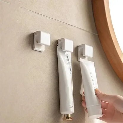 Punch-Free Wall-Mounted Toothpaste Holder – Bathroom Storage Rack & Hook Organizer